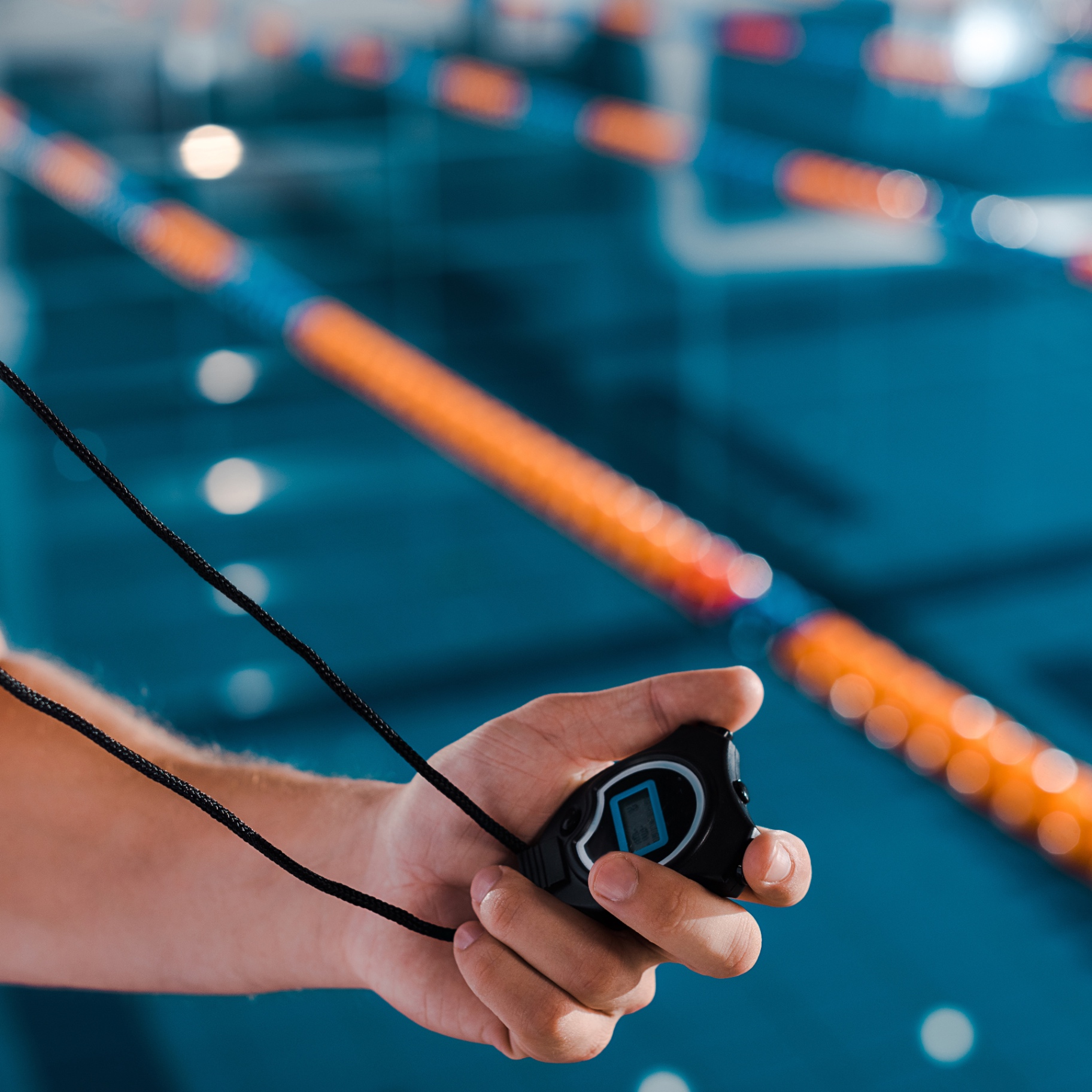 IB Aquatics coach giving poolside feedback